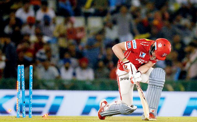 Kings XI Punjab’s David Miller is bowled by Gujarat Lions’ Dwayne Bravo during the IPL in Mohali last month. pic/afp