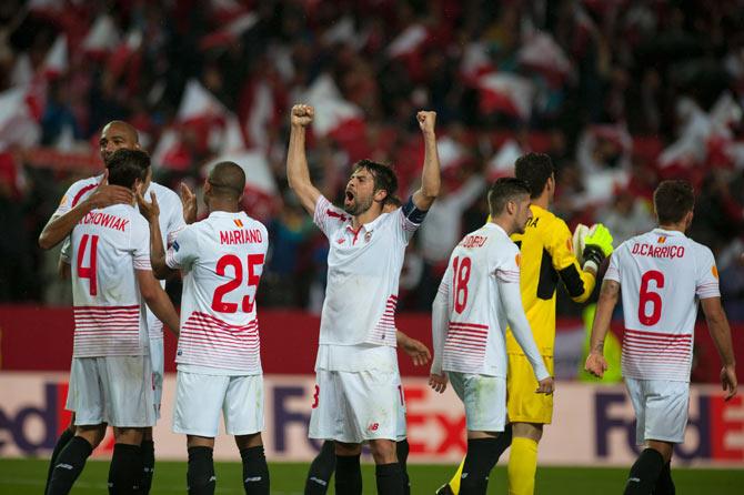Sevilla players celebrate their victory over Shakhtar at the end of the UEFA Europa League semi-final 