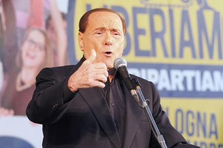 Young women indulged in lesbian sex at Silvio Berlusconi's 'inelegant' dinners