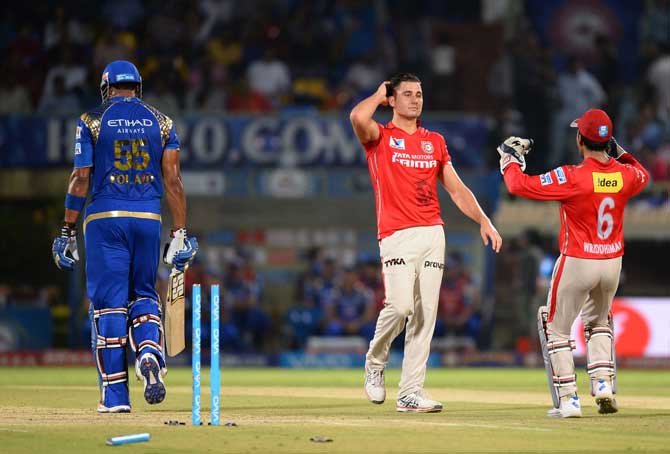 Man-of-the-match Marcus Stoinis celebrates the fall of a KXIP wicket on Friday night.