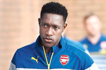 Arsenal's Danny Welbeck ruled out for nine months after surgery
