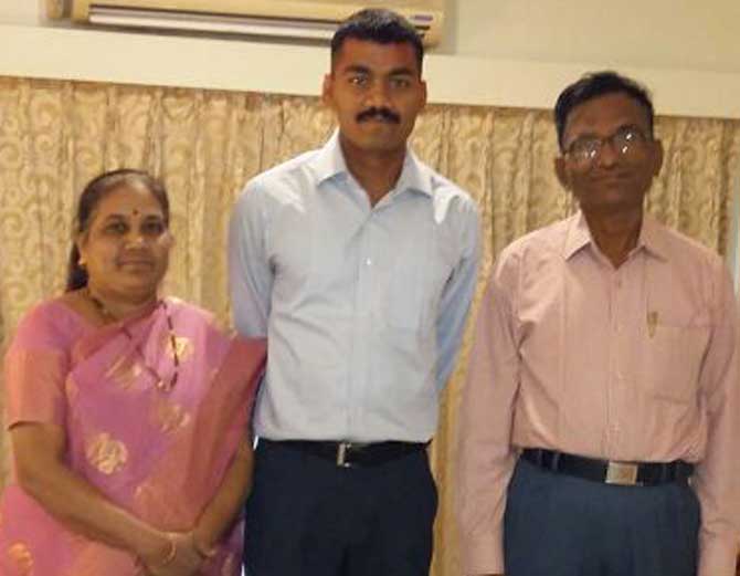 Maharashtra topper of the Union Public Service Commission (UPSC) results -- Yogesh Kubejkar -- with his parents Vijay and Sunita Kulkarni