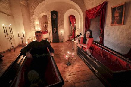 Indian-origin siblings sleep in coffins at Dracula's castle in Romania!
