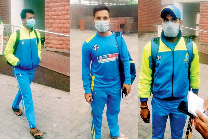 Ranji cricketers Pragyan Ojha, Shreevats Goswami and Manoj Tiwary wear pollution masks in New Delhi on Saturday. pic/PTI