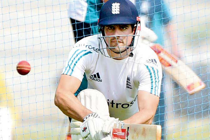 Alastair Cook executes the sweep shot during a training session at Brabourne on Saturday.  Pic/Suresh Karkera