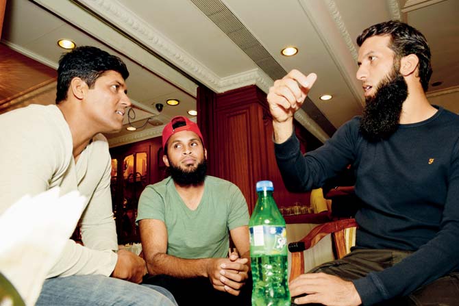 Coach Umesh Patwal (left) with Moeen Ali (right) and Adil Rashid during a party on November 3, 2016. Pic /Rajesh Shah