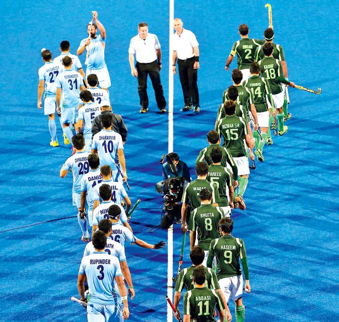 India and Pakistan players take the field for the 2014 Asian Games final in Incheon, South Korea. India won gold. Pic/Getty Images