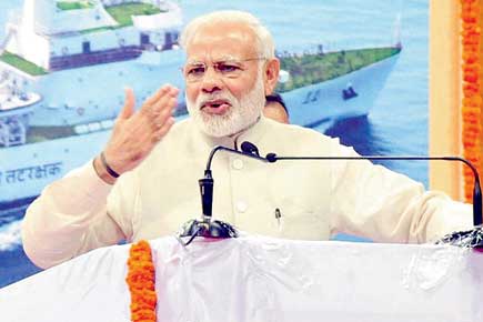 With tears, Narendra Modi tears into rivals, reaches out to masses