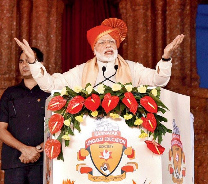 The PM, who also spoke about the Congress banning 25 paise coins, was speaking at the BJP’s Parivartan Yatra Rally at Ghazipur. File picture