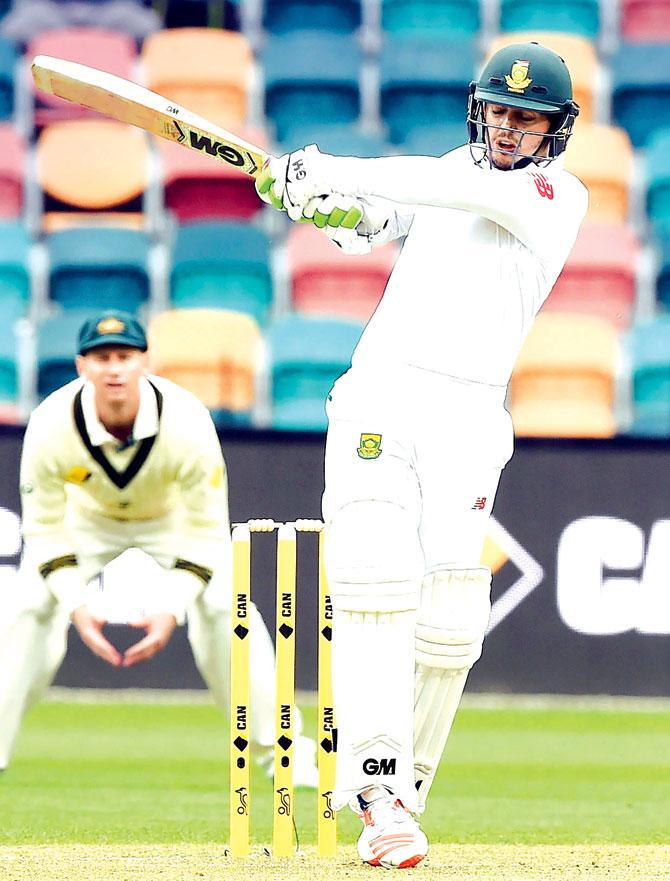 Quinton de Kock plays a pull shot on Day One of the Hobart Test vs Australia on Saturday. Pic/AFP