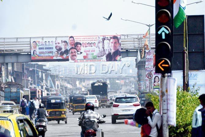 Congress workers put up over 500 banners of party vice-president Rahul Gandhi across the city. Pic /Sayyed Sameer Abedi