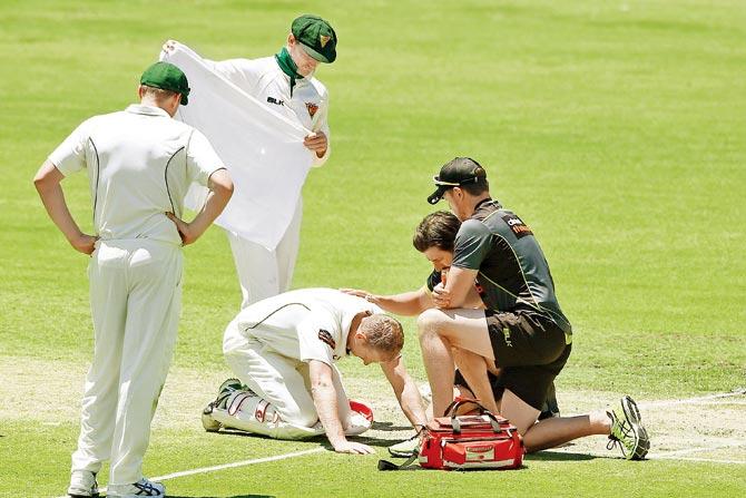 Adam Voges after being struck in the head in Perth yesterday. Pic/Getty Images