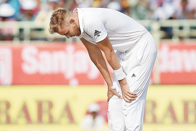 Stuart Broad reacts on first Day of the second Testin Vizag. Pic/ AFP
