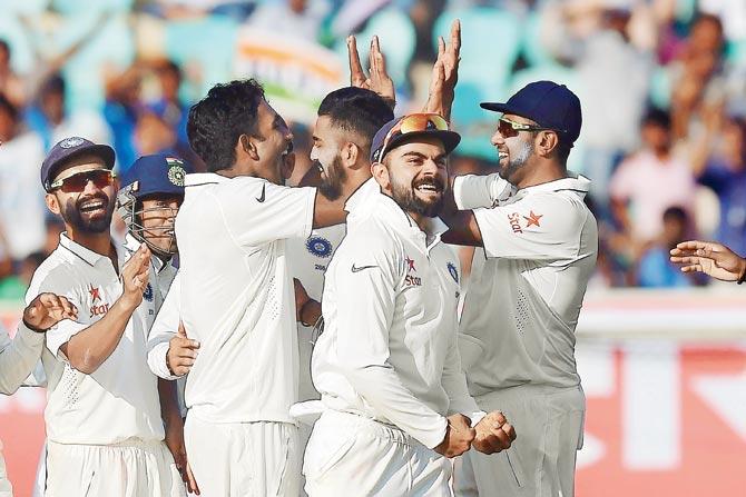 Jayant Yadav celebrates his first Test wicket (Moeen Ali) with his teammates in Visakhapatnam yesterday. Pic/PTI