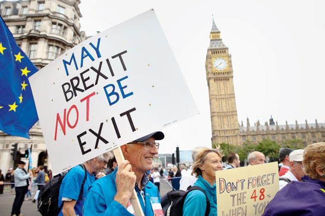 Protesters against the Brexit vote march in central London on September 3, 2016 . The OED named ‘post-truth’ — a term used during the Brexit referendum and Donald Trump’s campaign — as its international word of the year. PIC/AFP