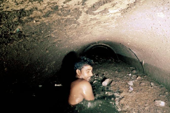 Saurav inside the storm drain in Antop Hill