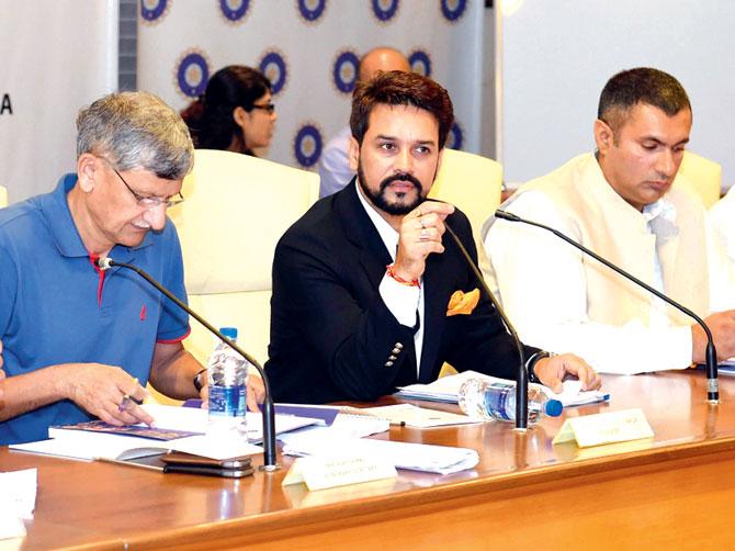 BCCI president Anurag Thakur (centre) flanked by Board secretary Ajay Shirke (left) and treasurer Anirudh Chaudhry