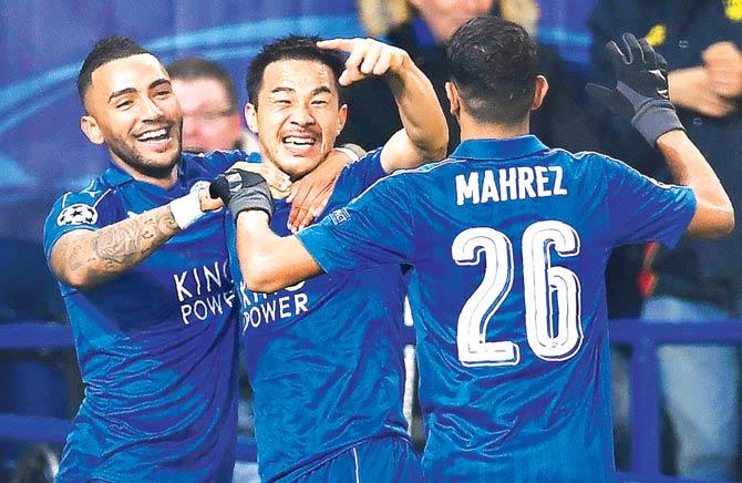Leicester City players celebrate a goal against Brugge at King Power Stadium in Leicester, England last night. Pic/AFP