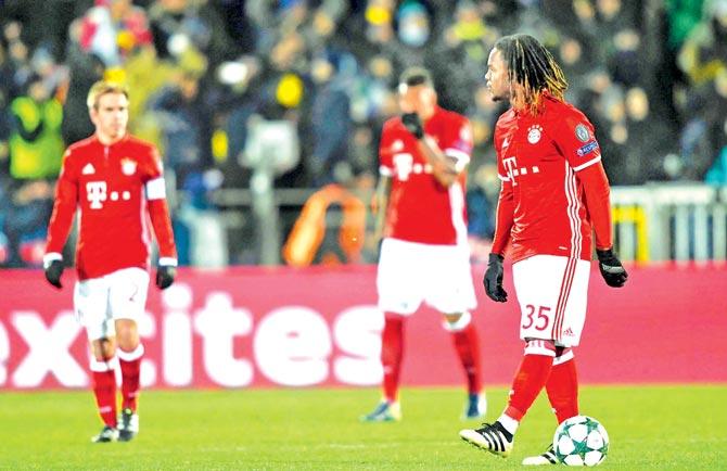 Bayern Munich players wear a dejected look after their defeat to Rostov in the Champions League tie last night. Pics/AFP