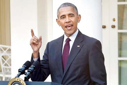 Barack Obama pardons last turkey with 'corny-copia' of jokes