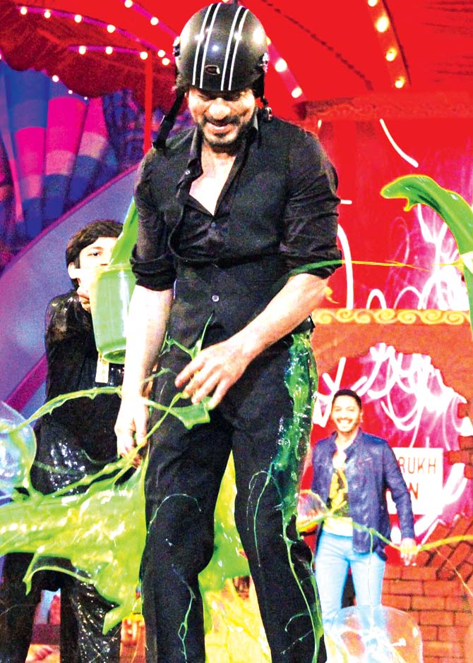 Shah Rukh Khan being slimed at an earlier event