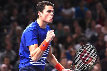 Raonic, Berdych advance to last 16 at ATP Paris Masters