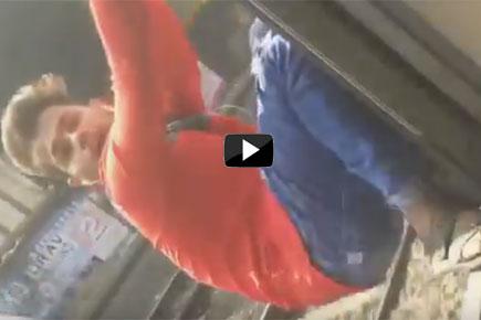 Viral video: Boy performing train stunt falls off Mumbai local