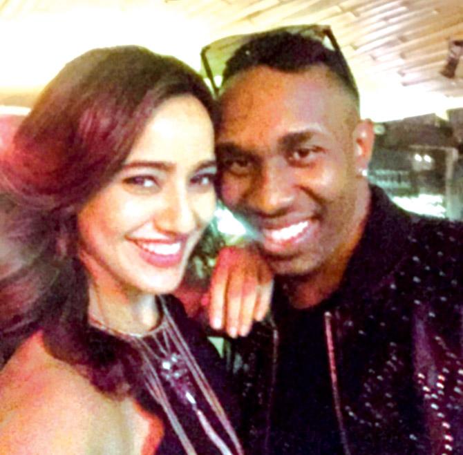 Neha Sharma posted this picture with Dwayne Bravo on Instagram