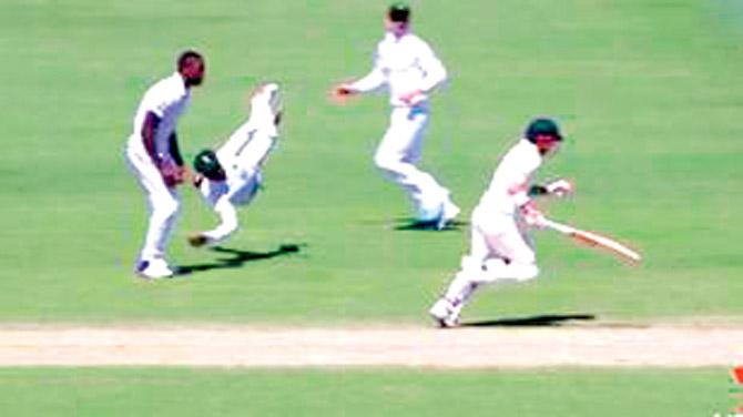 A screen grab of airborne SA fielder Temba Bavuma all set to throw the ball which would eventually run out Australia opener David Warner. Courtesy/channel 9 