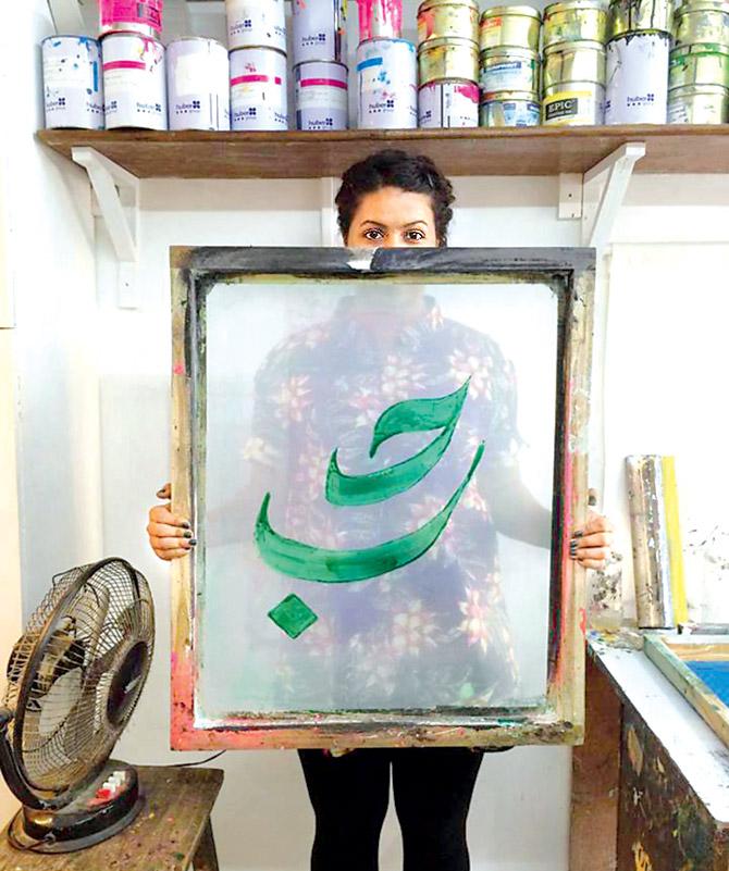 Zeenat with a print of Reluctant Fundamentalist. Pics/ Prajval Mendon