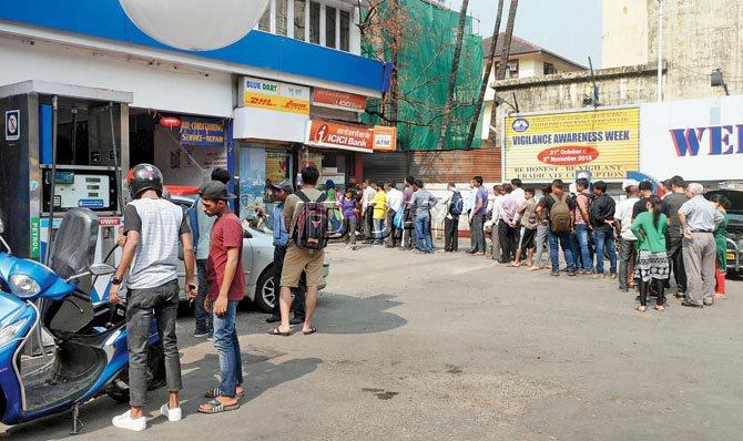 People queue up outside an ATM in Colaba to withdraw new currency notes. While the demonetisation move has already made stashed black money worthless, the KYC move could have an even bigger impact on corruption