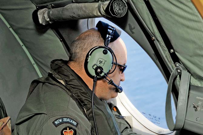 File photo of a Royal New Zealand Airforce crew member during the search off Perth. Pic/AFP
