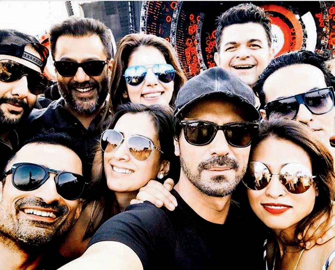 Arjun Rampal and friends at the Coldplay concert