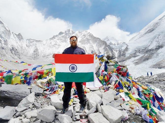 Dinesh (in pic) and his wife Tarakeshwari Rathod, both Maharashtra Police constables, doctored images of Satyarup Siddhanta and claimed to be the first couple to reach the summit of Everest. File pic