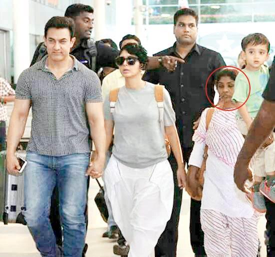 Aamir Khan at the airport with his wife Kiran and their cook Farzana (circled), who followed the actor on all his shoots