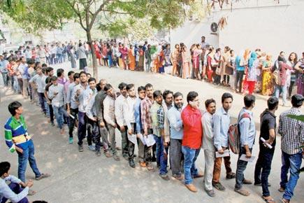 Demonetisation: Don't panic, says govt as serpentine queues continue