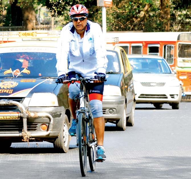 In 2013, Baijal cycled all the way from Delhi to Mumbai as a tribute to the Indian police force completing 150 years of service; Harish Baijal on his way from Dadar to his Bandra office