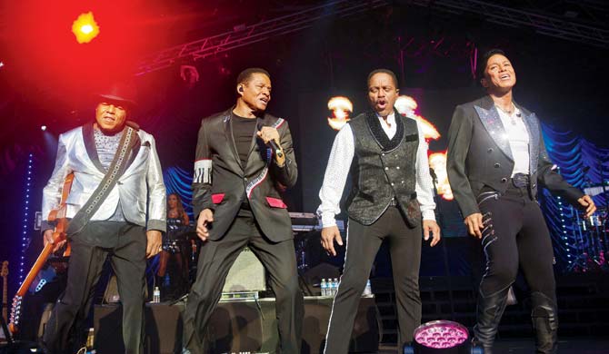 Tito, Jackie, Marlon and Jermaine Jackson perform at The Henley Festival in 2014, England. Pic/Getty Images