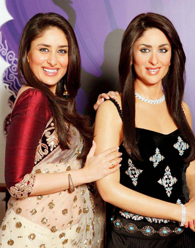 Actors Hrithik Roshan and Kareena Kapoor Khan with their wax statues in Madame Tussauds, London