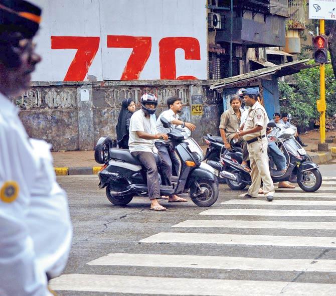 Not halting before the zebra crossing, also known as the stop line has emerged as major offence in the city. Representation pic