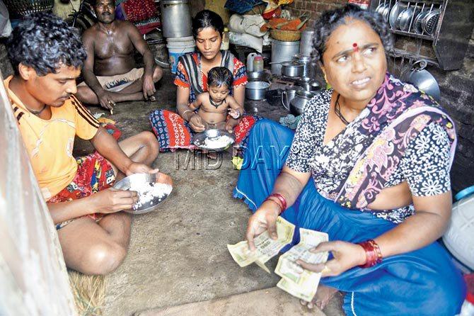 Sheela Chavan (right) is not sure what her family will eat once they run out of rice in a couple of days