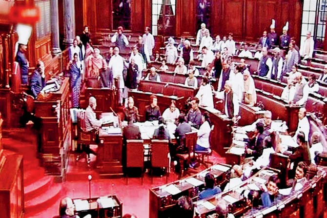 The chaos in both houses the Rajya Sabha