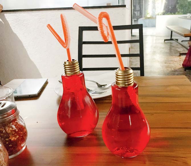 Raspberry Soda served in bulb-shaped containers