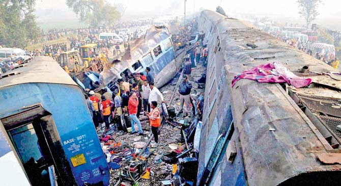 Rescue operations by railway personnel assisted by those of army, NDRF and state police, on at the mishap spot near Kanpur on Sunday. Most passengers were sleeping when the accident occurred. Pics/PTI