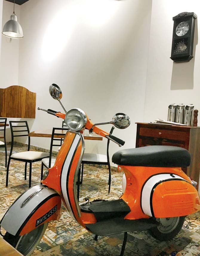 A scooter is part of the decor