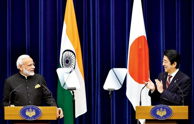 Prime Minister Narendra Modi and his Japanese counterpart Shinzo Abe at a joint press conference. PIC/AFP