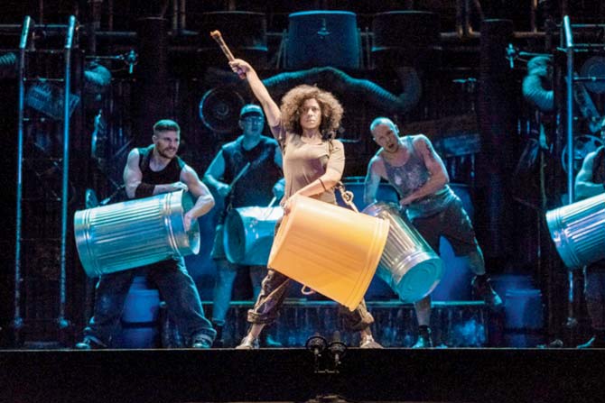The performers use trash cans, a kitchen sink and brooms for percussion at an earlier performance of Stomp