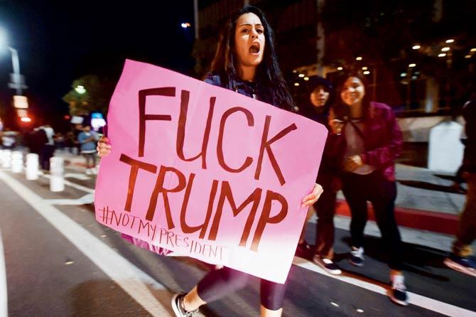 Protesters cause a chaotic traffic situation with the shutdown of a freeway in downtown Los Angeles, California, after the announcement of the US presidential election results. Pics/AFP