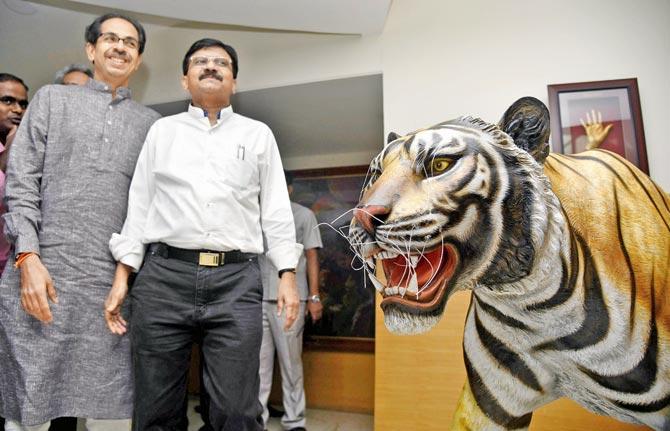 Uddhav Thackeray with Sanjay Raut during a press conference at Sena Bhavan yesterday. Pic/Sameer Markande