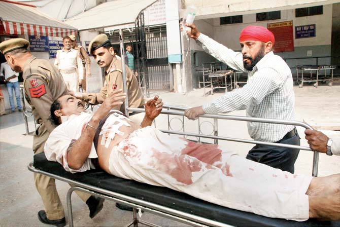 A villager injured in cross border firing by Pakistan on Tuesday. Pic/PTI